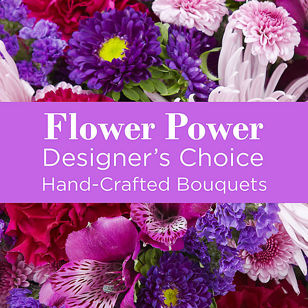A Purple Colored Florist Designed Vase